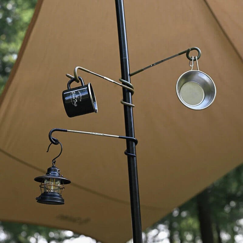 Various camping gear hanging from the versatile camping light pole hook.