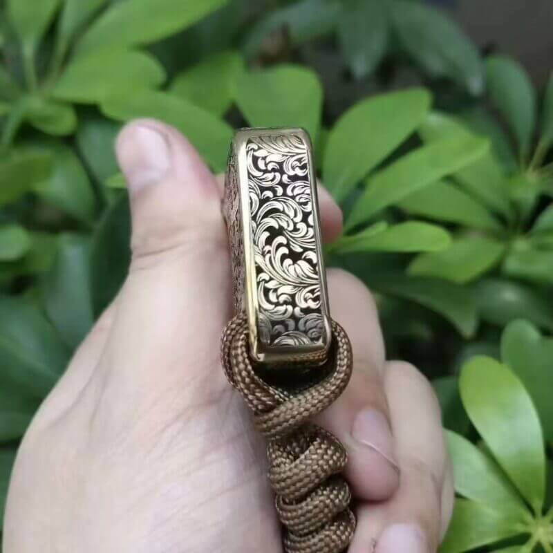 Bottom View of Finely carved brass knuckles self defense with Constantine-inspired Motif