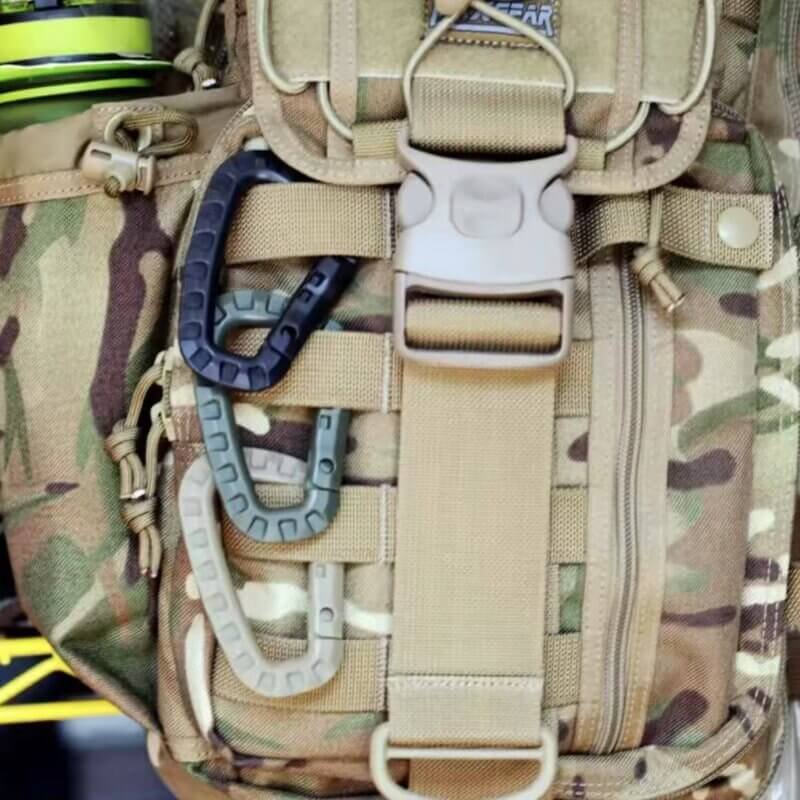 Heavy Plastic Tactical Carabiner Clip D Shape Hook Attached to a Backpack